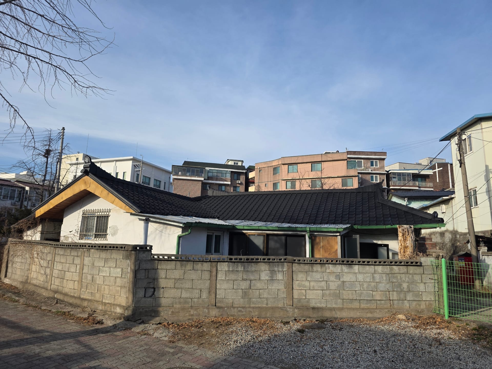 Single-story detached house, wood and cement block construction