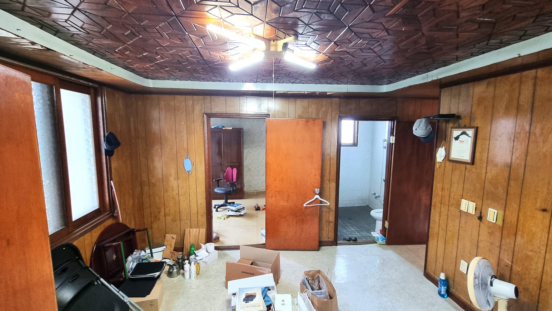House and storefront for sale in a residential area with future development potential